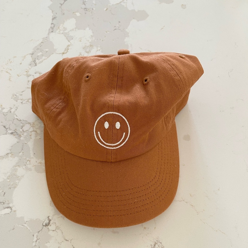 Smiley face Terra cotta hat
